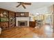 Open living space with hardwood floors, a fireplace, and seamless flow to the kitchen, great for entertaining at 2234 Hamilton Mill Rd, Charlotte, NC 28270