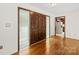Inviting entryway features rich wood floors, sidelight windows, and a solid wood door at 2309 Potter S Rd, Waxhaw, NC 28173