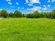 Picturesque acreage, cleared and ready for your dream home with mature trees and scenic views at 2309 Potter S Rd, Waxhaw, NC 28173