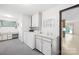 Bright laundry room featuring washer, dryer, utility sink, and workspace at 2309 Potter S Rd, Waxhaw, NC 28173