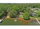 Aerial shot of lakefront homes surrounded by lush greenery and sparkling water at 2563 Brawley School Rd, Mooresville, NC 28117