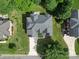 Overhead view of the home showing its location on a private lot with a long driveway and mature trees at 2608 Golden Bell Dr, Gastonia, NC 28056