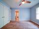 Light blue bedroom featuring double closets and an ensuite bathroom at 2608 Golden Bell Dr, Gastonia, NC 28056