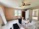 Bedroom featuring natural light from the windows, ceiling fan, and closet for renovation and customization at 2791 Neill Rd, Lancaster, SC 29720