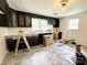 Kitchen area with potential, featuring windows, and cabinets, ready for customization and renovation at 2791 Neill Rd, Lancaster, SC 29720