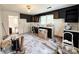 Kitchen with potential, featuring windows, cabinets, and new floors and is ready for customization and renovation at 2791 Neill Rd, Lancaster, SC 29720