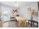 Versatile room features neutral colors, a ceiling fan, and a door to the exterior at 2996 N Lookout St, Claremont, NC 28610