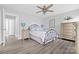 Bedroom with modern decor, wood-look floors and natural light at 2996 N Lookout St, Claremont, NC 28610