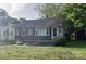 Charming single-story home featuring a well-maintained lawn and two sheds in the backyard at 327 Bonview Ave, Lincolnton, NC 28092
