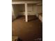 The basement features carpeted floors and white support beams at 341 Talley St, Troutman, NC 28166