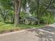 Charming home with well-maintained front yard and mature trees at 3459 Selwyn Ave, Charlotte, NC 28209