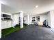 Finished basement featuring a home gym, rubber flooring, and ample workout space at 3801 Rosedown Dr, Matthews, NC 28105