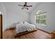 Bright bedroom features hardwood floors, a large window, and modern decor at 3801 Rosedown Dr, Matthews, NC 28105