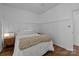 Cozy bedroom features neutral décor, hardwood floors, and ample natural light at 3801 Rosedown Dr, Matthews, NC 28105