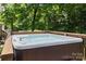 Outdoor hot tub featuring jets and comfortable seating to enjoy the outdoors at 3801 Rosedown Dr, Matthews, NC 28105