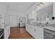 Spacious kitchen featuring granite countertops, stainless steel appliances, and white cabinets at 3801 Rosedown Dr, Matthews, NC 28105