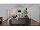 Spacious living room featuring high ceilings, arched windows, and elegant decor at 3801 Rosedown Dr, Matthews, NC 28105