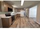 Updated kitchen featuring modern appliances, lots of cabinets and wood-look flooring at 408 N Hill St, Dallas, NC 28034