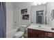 Full bathroom with a shower-tub combo, vanity with sink, and Star Wars decor at 4117 Bright Rd, Charlotte, NC 28214