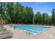 Community pool featuring a swimming lane, ladder and lots of sun loungers at 4117 Bright Rd, Charlotte, NC 28214