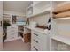 Bright craft room with custom storage solutions and a large workspace at 4201 Quail Hunt Ln, Charlotte, NC 28226