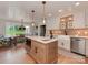 Well-equipped kitchen with sleek appliances, custom cabinetry, and a view of the landscaped backyard at 4201 Quail Hunt Ln, Charlotte, NC 28226