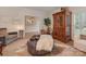 Comfortable living room showcasing elegant furnishings and seamless transition to the hallway and dining area at 4201 Quail Hunt Ln, Charlotte, NC 28226
