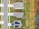 Aerial view showcasing neat rooftops and landscaped yards in a well-maintained neighborhood at 449 Misty Law Ln, Clover, SC 29710