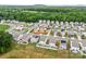 An aerial view of a suburban neighborhood with well-maintained homes and green spaces at 449 Misty Law Ln, Clover, SC 29710