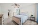 Spacious bedroom with carpet, ceiling fan and a view of closet space at 449 Misty Law Ln, Clover, SC 29710