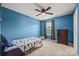 This bedroom features a bed, ceiling fan, a window, and a dresser at 449 Misty Law Ln, Clover, SC 29710