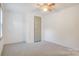 Cozy bedroom featuring neutral carpet and a closet at 4648 Rifle Range Rd, Conover, NC 28613