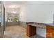 Dining area with tile floors, beadboard, windows, and a chandelier, next to the kitchen at 4648 Rifle Range Rd, Conover, NC 28613