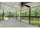 Expansive covered back porch with fan offering ample seating and relaxation at 4648 Rifle Range Rd, Conover, NC 28613