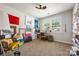 Spacious bedroom featuring carpet, a modern ceiling fan, and an abundance of art at 5088 Watersail Way, Clover, SC 29710