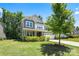 Beautiful two-story house on a well-maintained lawn with mature trees at 5088 Watersail Way, Clover, SC 29710