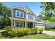 Charming two-story home features a well-manicured lawn and lush landscaping at 5088 Watersail Way, Clover, SC 29710