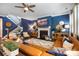 Inviting living room with stylish decor, hardwood floors, and a staircase at 5088 Watersail Way, Clover, SC 29710