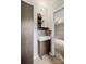 Modern bathroom featuring a stylish sink, dark wood cabinetry, and contemporary fixtures at 607 Coulwood Dr, Charlotte, NC 28214