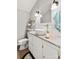 Stylish bathroom with modern vessel sink, granite counters, and white cabinets at 607 Coulwood Dr, Charlotte, NC 28214
