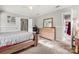 Neutral bedroom with carpet, closet, dresser, mirror, and comfortable bed frame at 607 Coulwood Dr, Charlotte, NC 28214