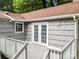 Rear exterior of the home featuring french doors leading to an elevated deck at 607 Coulwood Dr, Charlotte, NC 28214