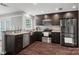 Well-equipped kitchen featuring sleek cabinetry and stainless steel appliances at 607 Coulwood Dr, Charlotte, NC 28214