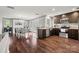 Modern kitchen with stainless steel appliances and wood flooring at 607 Coulwood Dr, Charlotte, NC 28214