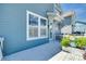 Back deck of house with blue siding and white trim at 750 Waterscape Ct, Rock Hill, SC 29730