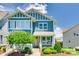 Charming blue two-story home with landscaped front yard and a welcoming porch at 750 Waterscape Ct, Rock Hill, SC 29730