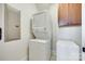 Stackable washer and dryer in laundry area with cabinets at 750 Waterscape Ct, Rock Hill, SC 29730
