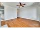 Bright living room featuring hardwood floors, a ceiling fan, and neutral wall color at 750 Waterscape Ct, Rock Hill, SC 29730