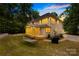 Backyard with a screened-in porch and comfortable seating, plus a hammock at 763 Evans Manor Dr, Weddington, NC 28104