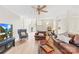 Open-concept living room featuring hardwood floors and comfortable seating at 763 Evans Manor Dr, Weddington, NC 28104